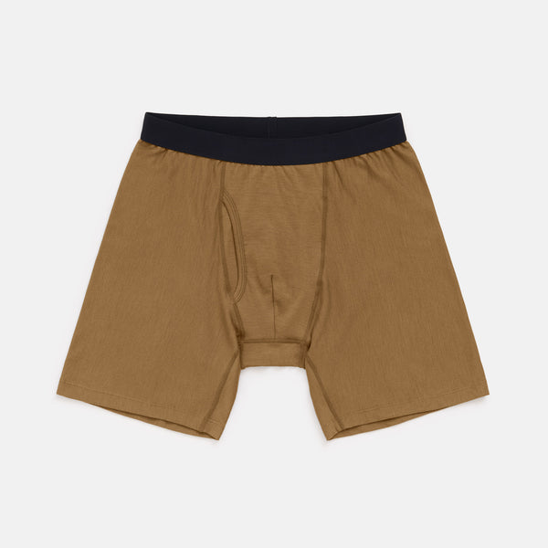 Laydown of merino wool Long Boxer Brief in Cedarwood, a dark mustard brown color. This is a men's boxer brief with a 6.5 inch inseam available in sizes XS-XXL. 