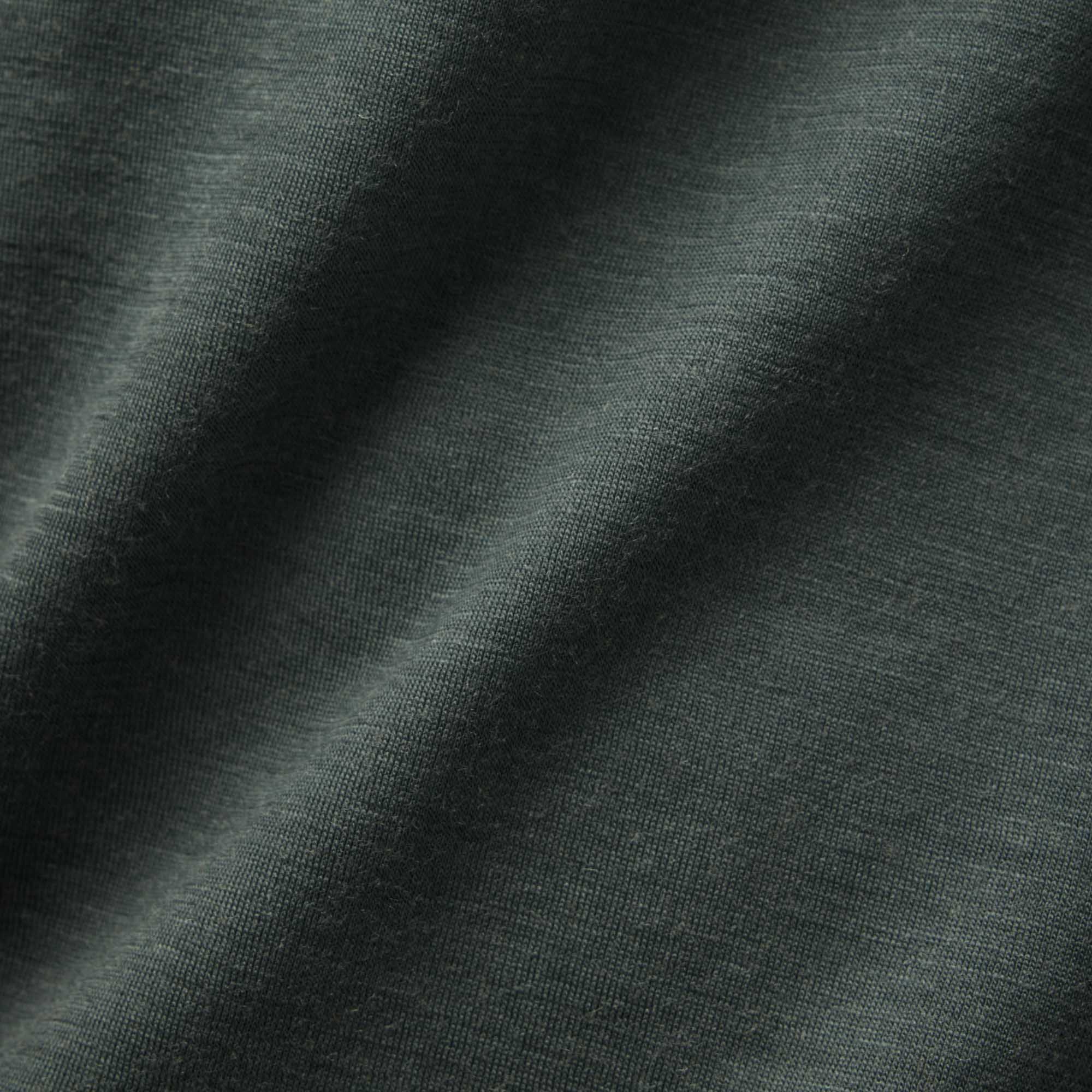 Detail of 100% Merino Wool Fabric in Hunter Green.