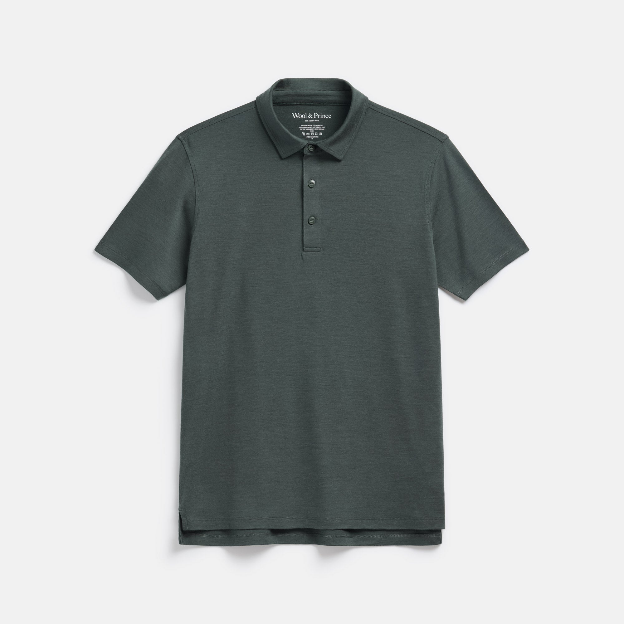 Laydown of 100% Merino Wool Polo Shirt in Hunter Green, a dark green with blue undertones. This short sleeve, crew neck t-shirt is available in sizes XS-XXL.