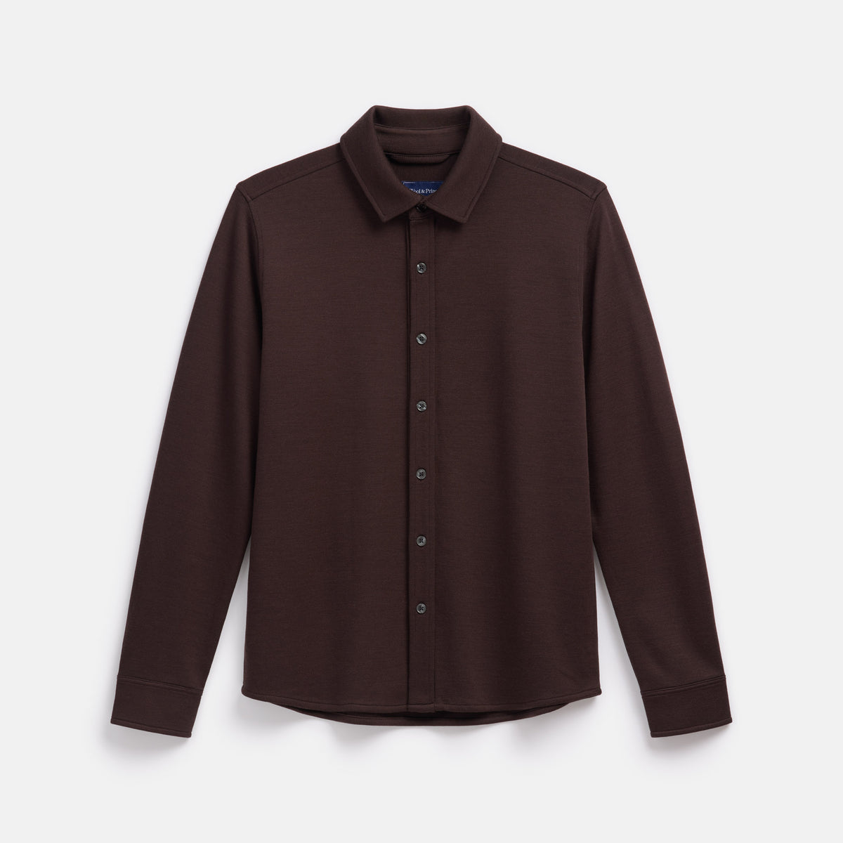 Laydown of merino wool Midweight Pique Button-Down Shirt in Espresso, a dark brown color. This is a long sleeve, collared, casual button-down shirt available in sizes S-XXL.